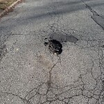 Pothole at 10 Governor Hutchinson Rd