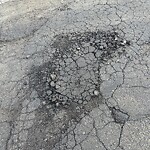 Pothole at 15 Apollo Ave